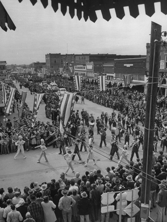 Local Band Marching in Parade, with Large Crowd in Attendance Stretched Canvas Print