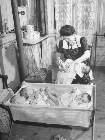 Mme. Madeleine Couverchel Caring for Illegitimate War Babies with American GI Fathers at Her Farm Stretched Canvas Print
