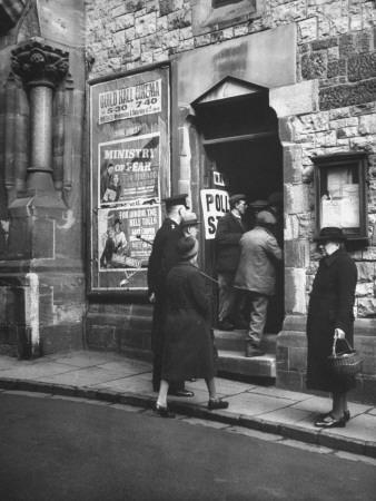 Voters Going in to Cast their Vote at One of the Many Polling Stations Throughout Large District Stretched Canvas Print