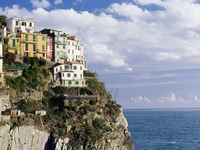 Houses on Sea Cliff in Manarola Stretched Canvas Print