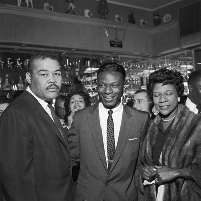 Nat King Cole Is Flanked by Boxing Great Joe Louis and His Wife Rose Morgan Stretched Canvas Print