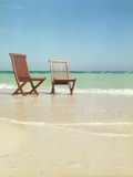 Pair of Wooden Lounge Chairs on Beach