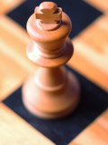 King chess piece on chessboard