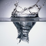 Droplet Penetrating Water's Surface