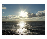 Sun Piercing Through the Clouds