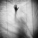 Shadow of a Hand Against Cloth