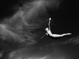 Woman Performing Swan Dive
