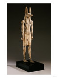 An Egyptian Wood Figure of a Jackal-Headed Deity  New Kingdom  1550-1070 BC