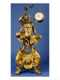 An Ormolu Mantel Clock with a Shaped Rectangular Base on Four Lion's Paw Feet