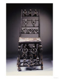 A Fine Chokwe Chair Carved with Various Figures