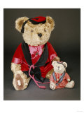 Noel  a Curly Brown Mohair Teddy Bear Wearing a Red and Black Smoking Jacket