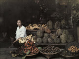 Lady Sits by Her Bangkok Stand of Unique Fruit