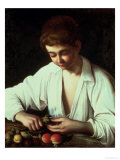 A Young Boy Peeling an Apple