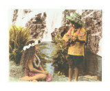 Hawaiian boy and girl at waterfall