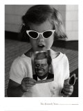 Caroline Kennedy holds a Postcard of her Father  1961