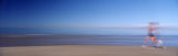 Blurred Motion  Side Profile of a Woman Running on the Beach