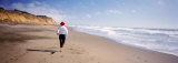 Woman Jogging on Beach  California  USA