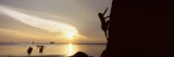 Silhouette of a Man Climbing a Rock  Railay Beach  Krabi  Thailand