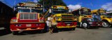 Buses Parked in a Row at a Bus Station  Antigua  Guatemala