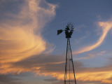 A Lone Windmill Dots the Prairie Landscape