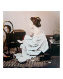 Young Japanese Woman Applying Powder