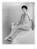 Her Legs Outstretched  Wearing a Pair of Short-Sleeved Pyjamas