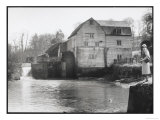 Stylish Woman Well Wrapped up for a Cold Day Stops to Admire Castle Mill Dorking Surrey England