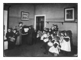 Music Lesson at a German School One Teacher Plays the Piano