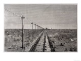 Telegraph Lines Running Alongside a Railway at a Remote Station in the Great Plains of America