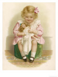 Little Girl in a Pink Dress with a Pink Ribbon in Her Hair Dresses Her Doll