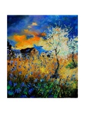 Blue wild flowers and blooming tree