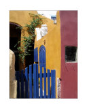 Colorfully Painted House with a Blue Fence in Santorini  Geece