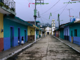Painted Row of Houses with Distant Chapel in Acatlan  Veracruz  Mexico