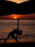 Woman Doing Yoga at Sunset  Phuket  Thailand  United States of America