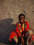 Young Boy Sitting in Front of Wall  Djenne  Mali