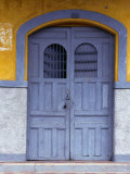 A Smokey Grey Wooden Door of a Painted Colonial House  Granada Granada  Nicaragua