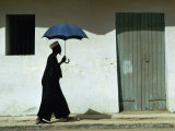 Man Walking with Umbrella  St Louis  Senegal