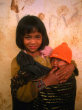 Young Koho Child Holding Baby at "Chicken Village " Lam Dong  Vietnam