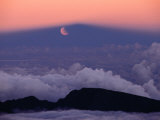 Lunar Eclipse at Sunset with a Moonrise from Summit of Mt Haleakala  Haleakala NP  Maui  Hawaii