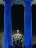 Abraham Lincoln Statue Between Blue Floodlit Columns of Lincoln Memorial  Washington Dc  USA