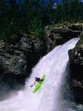 Kayaker Going Down Waterfall of Store Ula River  Rondane National Park  Norway