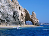 Tour Boat in the Water by El Arco  a Natural Arch at Land's End Cabo San Lucas  Mexico