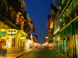 Flags Hanging Over the Empty Bourbon Street at Night  New Orleans  Louisiana  USA