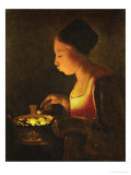 Girl Blowing on a Brazier  circa 1645