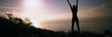 Young Woman Exercising on a Hill