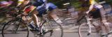 Group of People Cycling