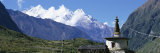 Manaslu Trek  Chorten  View of a Temple at the Base of a Mountain  Nepal