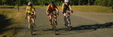 Three Adult Women Cycling