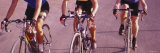 Three Women Cycling