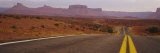 Highway Passing through an Arid Landscape  Monument Valley Tribal Park  Arizona  USA